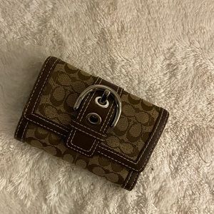 Coach wallet signature logo